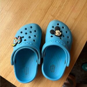 CROCS Kids Light Blue Clog Sandals with Character Jibbitz